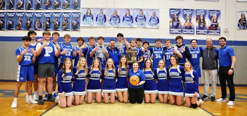 The Princeton Tigers and cheerleaders celebrate their 59-53 victory over Seneca to claim their record fourth straight regional championship. The Tigers (20-12) advance to the Marengo Sectional to face Byron at 7 p.m. Wednesday.
