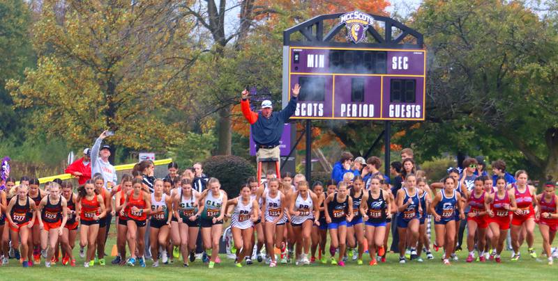 Girls runners begin the Fox Valley Conference Cross Country Meet at McHenry County College in Crystal Lake on Saturday, October. 18, 2025.