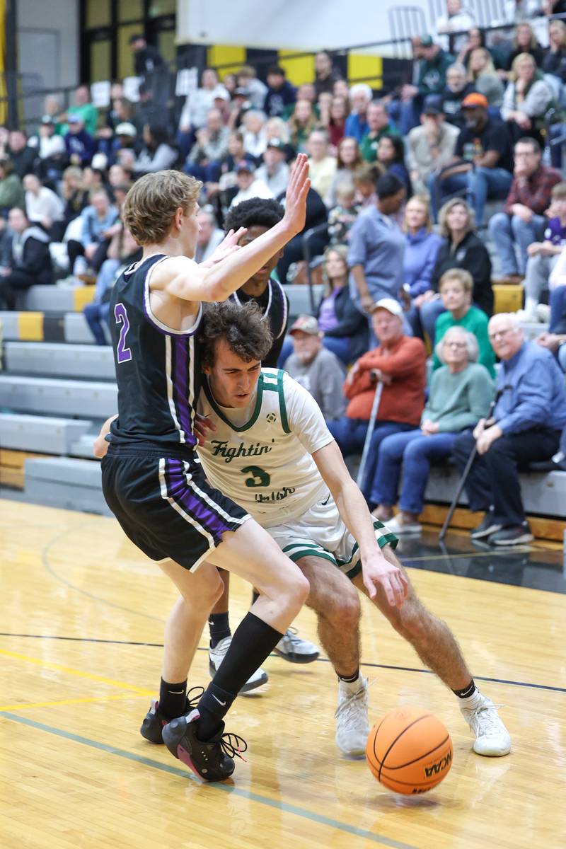 Bishop McNamara's Preston Payne drives to the lane during the Fightin' Irish's 66-52 victory over El Paso-Gridley in the IHSA Class 2A Herscher Regional championship on Friday, Feb. 27, 2026.