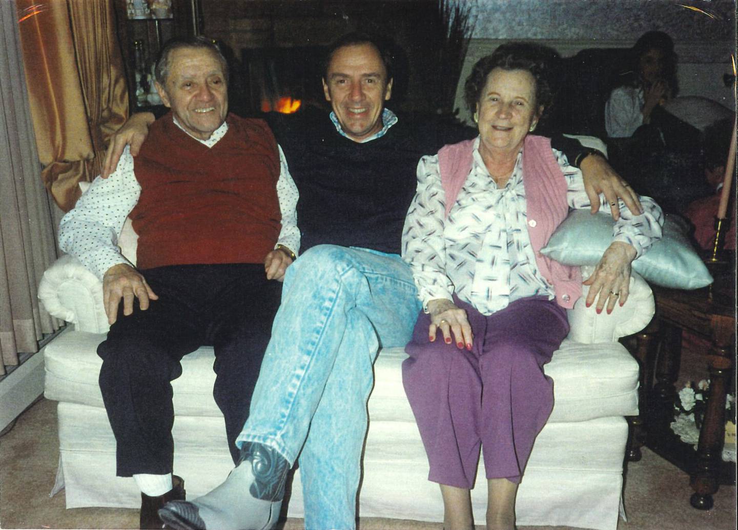 Joe Schmitz of Operation St. Nick pictured with both his parents.