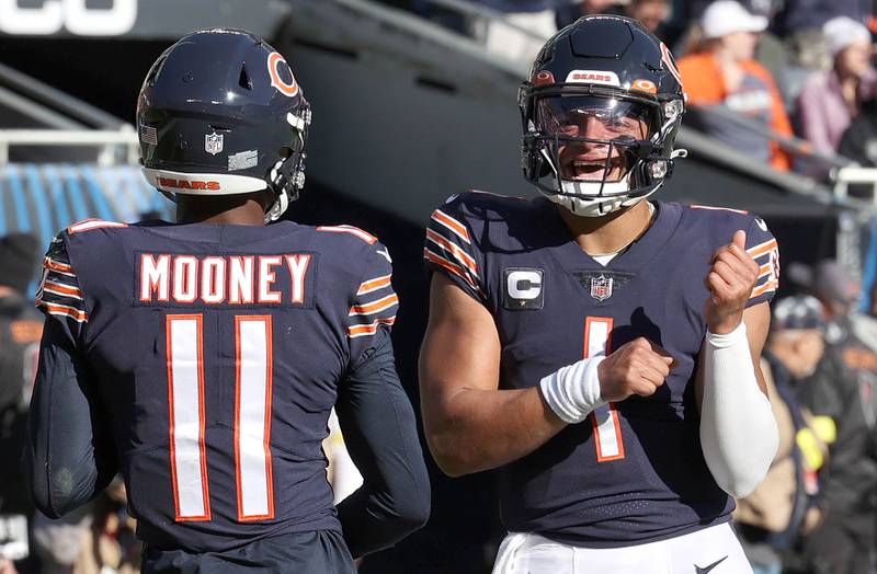 Chicago Bears wide receiver Darnell Mooney and Justin Fields do a dance after connecting on a touchdown pass during their game against Miami Sunday, Nov. 6, 2022, at Soldier Field in Chicago.