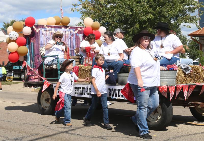 A cowboy-western "We Got Spirit" float passes along South Main Street during the 54th annual Homestead Festival parade on Saturday, Sept. 6, 2025 in Princeton.