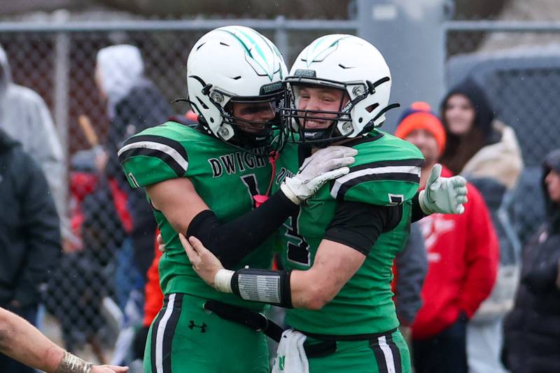 Drew Anderson (Left) and Collin Bachand (Right) of Dwight/Gardner-South hug in celebration on Saturday, November 9, 2024 at Dwight High School in Dwight.