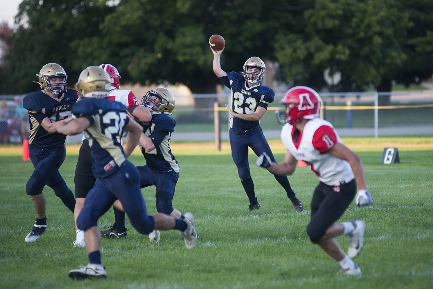 Polo’s Cayden Webster throws a pass Friday, Aug. 26, 2022 against Amboy.