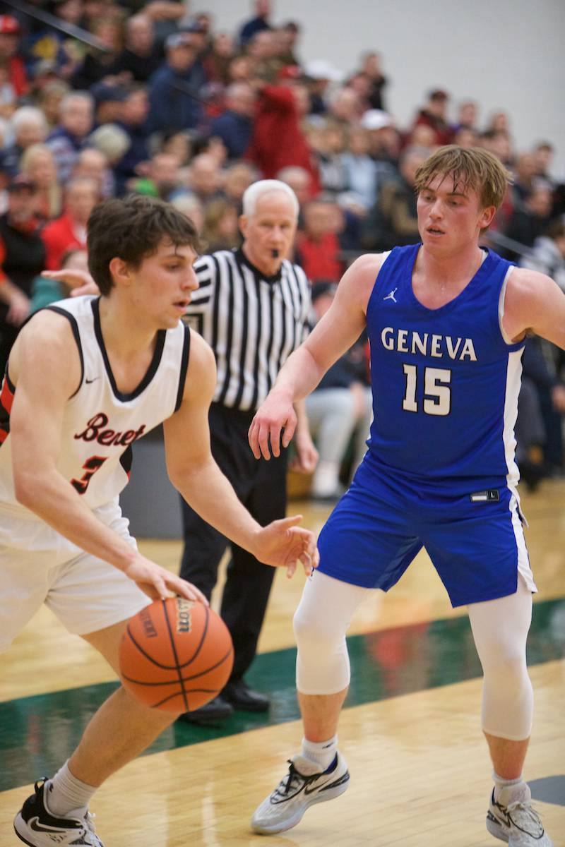 Benet's Brady Kunka drives the baseline against Geneva's Jimmy Rasmussen at the Class 4A Sectional Final at Bartlett on Friday, March 3, 2023.