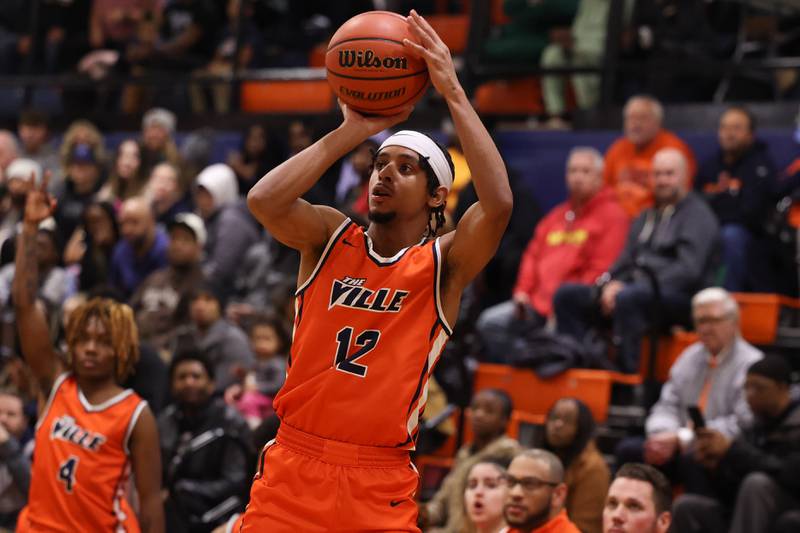 Romeoville’s Troy Cicero Jr. takes the deep shot against Joliet West on Tuesday January 31st, 2023.