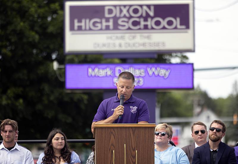 Brad Sibley, who proposed having the street in front of Dixon High School named “Mark Dallas Way,” speaks during a ceremony on Tuesday, May 30, 2023.