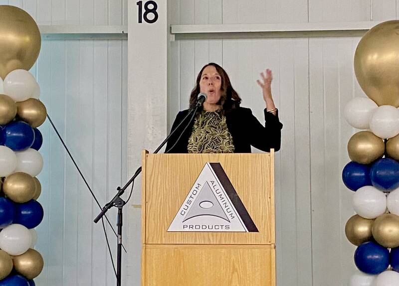 Jennifer Groce, Genoa Area Chamber of Commerce Board of Directors member,  speaks as emcee of the evening on Thursday, Feb. 13, 2025, at the chamber's 68th Annual Meeting and Awards Dinner at Custom Aluminum Products, 312 Eureka St., Genoa.