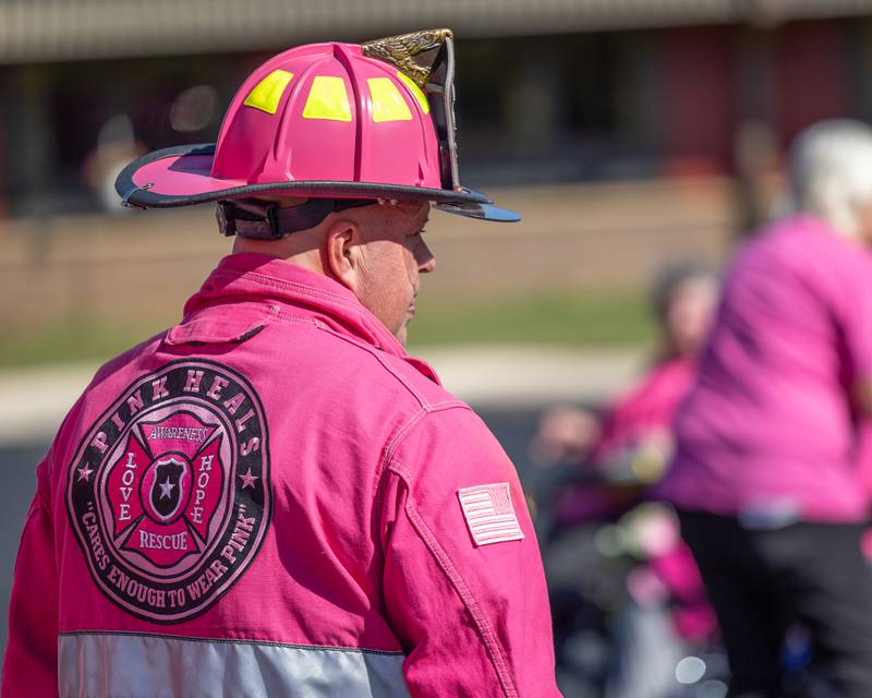 Brian Tribley of the Pink Heals, Rock Falls chapter looks over shoulder on Wednesday, Oct. 8, 2025 at the LaSalle County Nursing Home in Ottawa.