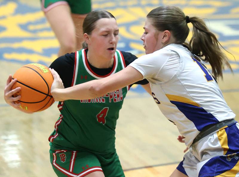 La Salle-Peru's Alexus Hines tries to hold off Somonauk-Leland's Kiley Mason during their game Thursday, Nov. 20, 2025, in the Tim Humes Breakout girls basketball tournament at Somonauk High School.