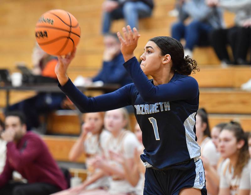 Nazareth’s Allia Von Schlegell shoots one of her six  three pointers during a Coach Kipp Hoopsfest game against Montini on January 20, 2025 at Benet Academy in Lisle.