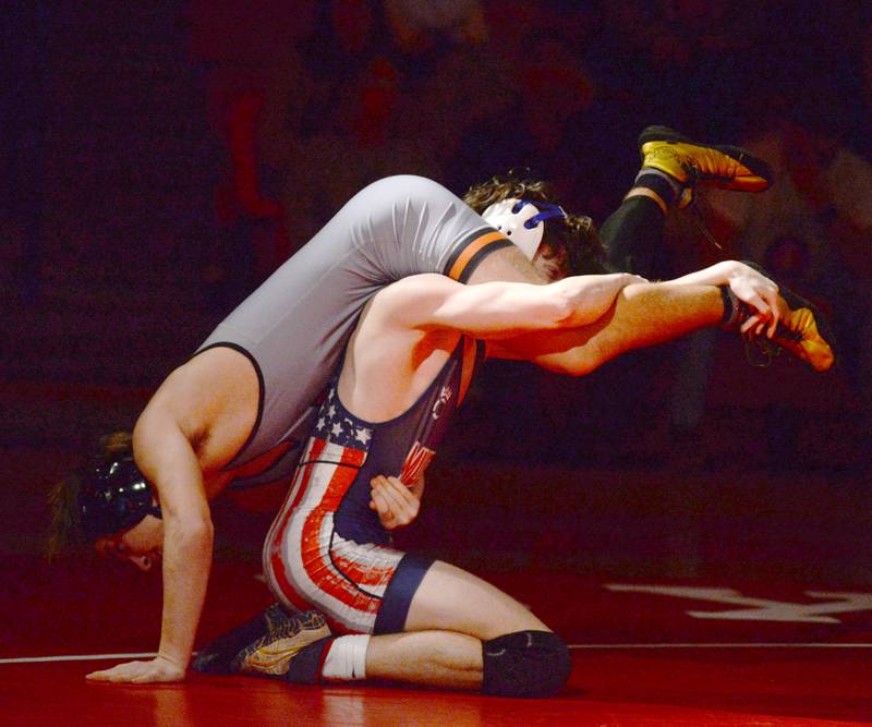 Morrison's Zach Milder (bottom) lifts his Sandwich opponent in the 138-pound match at a triangular meet with Oregon on Friday, Jan. 31, 2025 in the Blackhawk Center at Oregon High School.