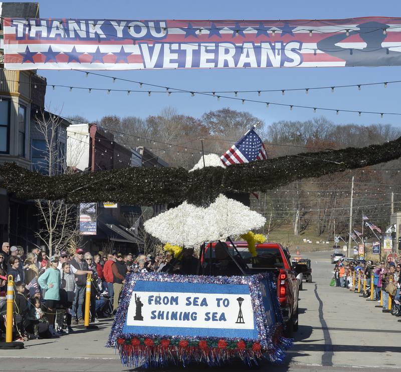 Large crowds gathered Sunday, Nov. 6, 2022, along Mill Street as the Utica Veterans Day Parade and Air Show rolled through town. Billed as one of the largest in the state, crowds were treated to many floats and an air show.