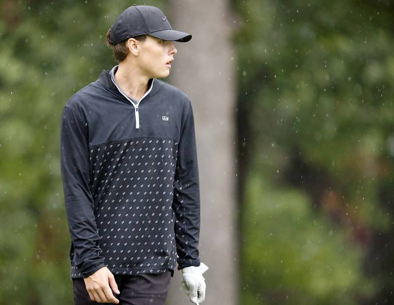 Nathan Carlson, Glenbard North, looks for the break of the green during the DuKane Conference Boys Varsity Tournament Tuesday, Sept. 24, 2024 Bartlett Hills Golf Club.