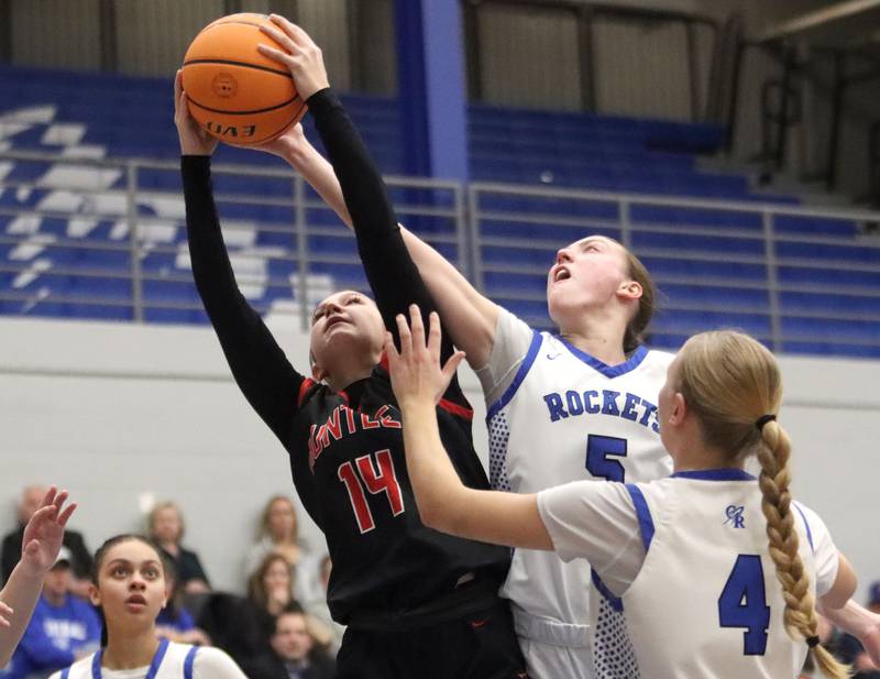 Huntley’s Sara Bruns, left, battles Burlington Central’s Audrey LaFleur for the ball in varsity girls basketball on Monday, Feb. 9, 2026, at Central High School in Burlington.