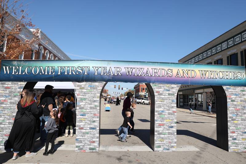 Event goers enter Liberty Street for the Magic in Morris event on Saturday.