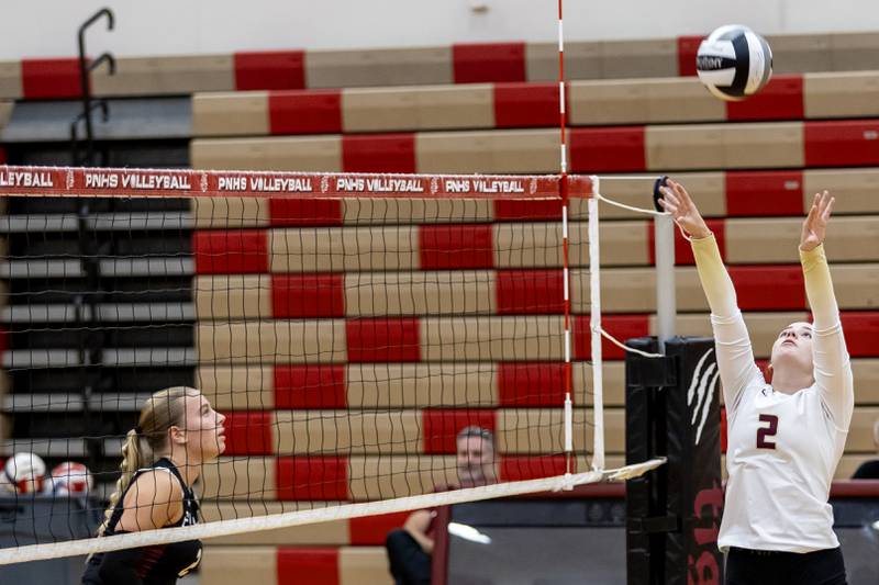 Morris's Alexis Williams sets-up a teammate during a varsity volleyball away game against Plainfield North on Sept. 2, 2025.