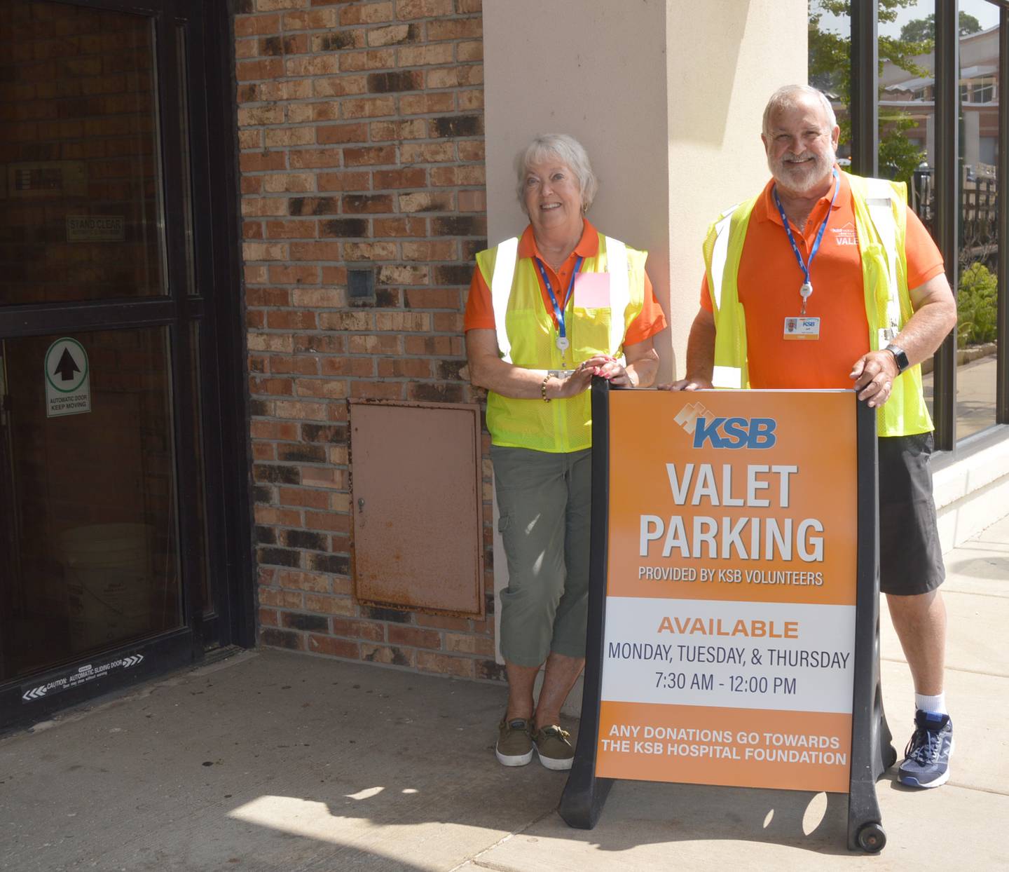 Jeanne and Jeff Kuhn, of Dixon, served as volunteer valets at KSB Commerce Towers on Monday. The service has been reinstated from 7:30 a.m. to noon on Monday, Tuesday and Thursday, and is being staffed by volunteers.
