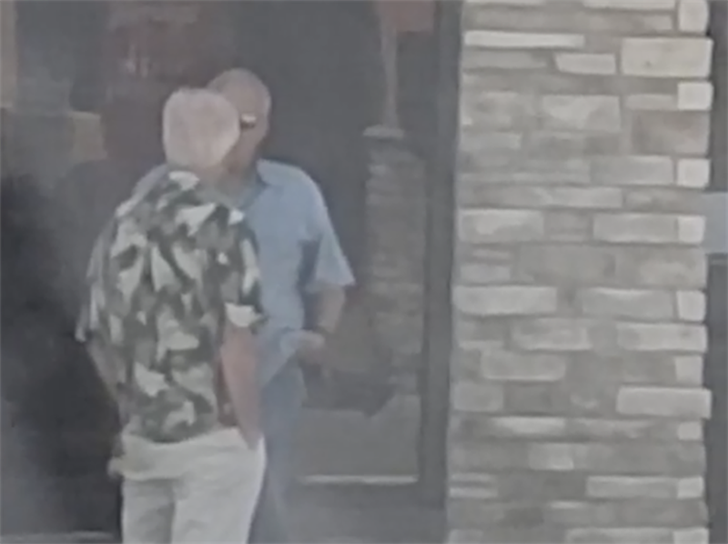 FBI surveillance footage shows then-state Sen. Terry Link, D-Vernon Hills, speaking with then-state Rep. Luis Arroyo, D-Chicago, outside a Wendy's in Highland Park in August 2019. Link had been wearing a wire when Arroyo offered him a bribe.