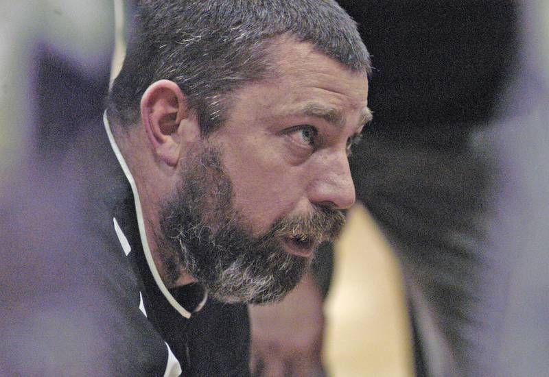 Dixon Head Coach Chris Harmann talks with his team near theend of the game. Dixon hosted Rock Falls in boys basketball Friday, February 14, 2025 at Lancaster Gym at Dixon High School. Rock Falls won a hard fought game 48-46.