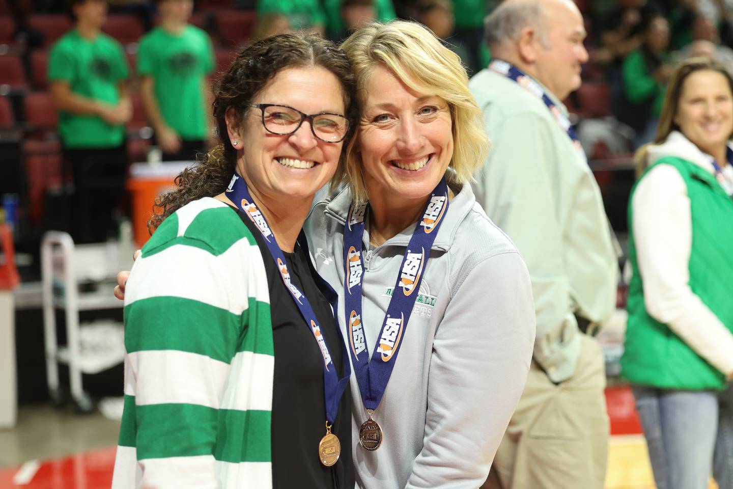 Rock Falls head coach Shelia Pillars, left, poses with assistant coach Jolene Bickett with their Class 2A Third Place medals after the Rockets win against Carmi-White County in the Class 2A Volleyball Third Place match on Saturday, Nov. 11, 2023 in Normal.