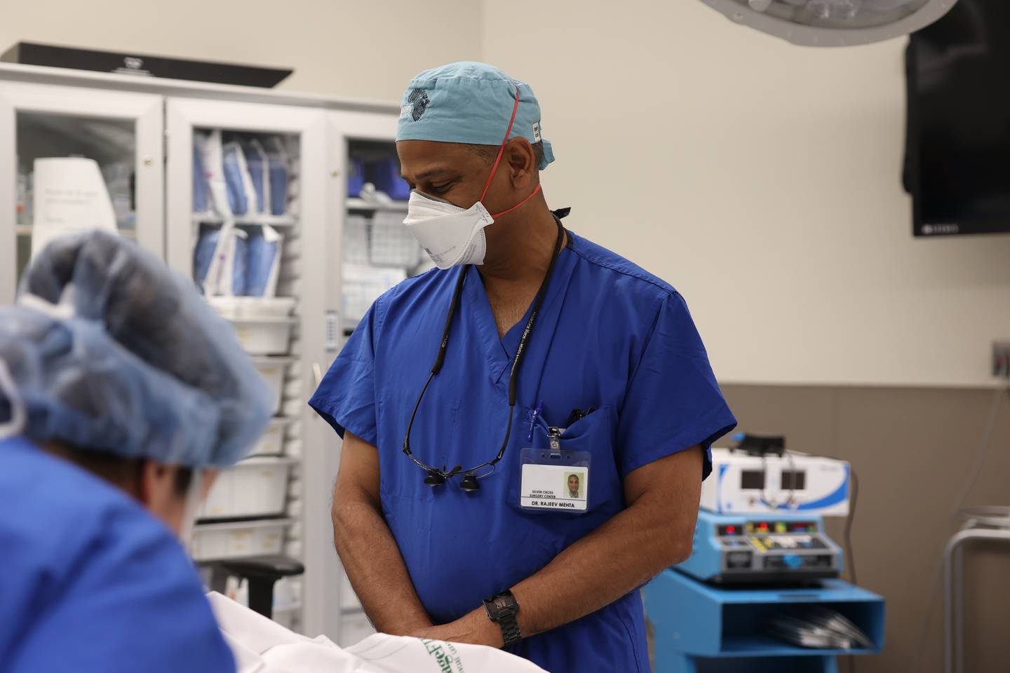 Dr. Rajeev Mehta talks with a patient before implanting an Inspire device to help with sleep apnea at Silver Cross Hospital. Wednesday, June 28, 2022 in New Lenox.