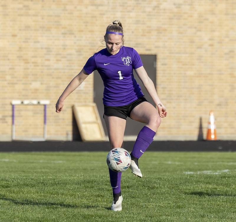 Dixon’s Micki Worrell handles the ball while facing off against on Oregon Thursday, April 25, 2024 at Dixon High School.