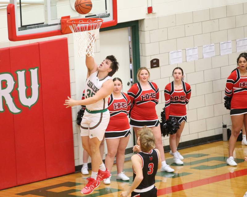 L-P's Nolan Van Duzer runs in for a layup over Hall's Max Bryant on Tuesday, Nov., 28, 2023 in AJ Sellett Gymnasium at L-P High School.