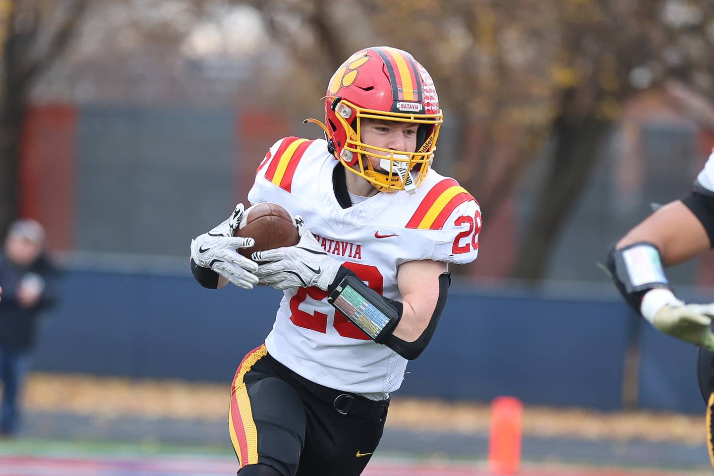 Batavia's Henry Hahn rushes against St. Rita in the Class 7A state semifinal on Saturday, Nov. 22, 2025 in Chicago.