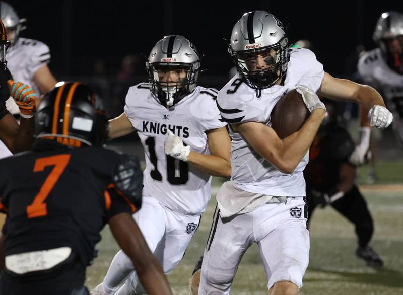 Kaneland's Carter Grabowski looks to get by DeKalb's Antwaun Thomas during their game Friday, Sept. 12, 2025, at DeKalb High School.