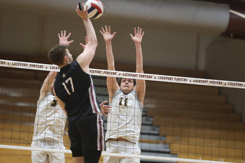 Joliet West’s Max Neverman goes for the block against Lockport on Tuesday, March 31, 2026 in Joliet.