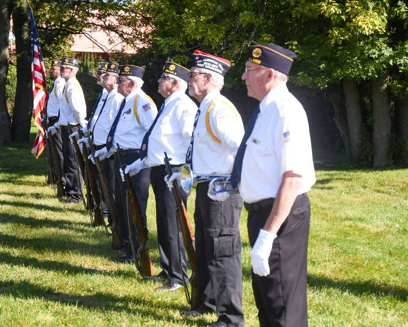 The DeKalb American Legion Honor Guard stands during a dedication ceremony marking the completion of phase one of the DeKalb Elks Veteran’s Memorial Plaza in DeKalb Saturday, Oct. 1, 2022.