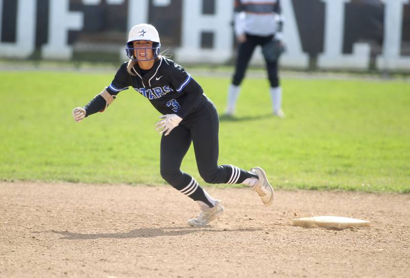 St. Charles North’s Leigh VandeHei rounds second base during a game at Wheaton Warrenville South on Thursday, April 14, 2022.