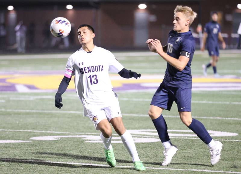 Mendota's Sebastian Carlos eyes the ball as Quincy Notre Dame's Nolan Heck defends during the Class 1A Supersectional game on Monday, Nov. 3, 2025 at Mendota High School.