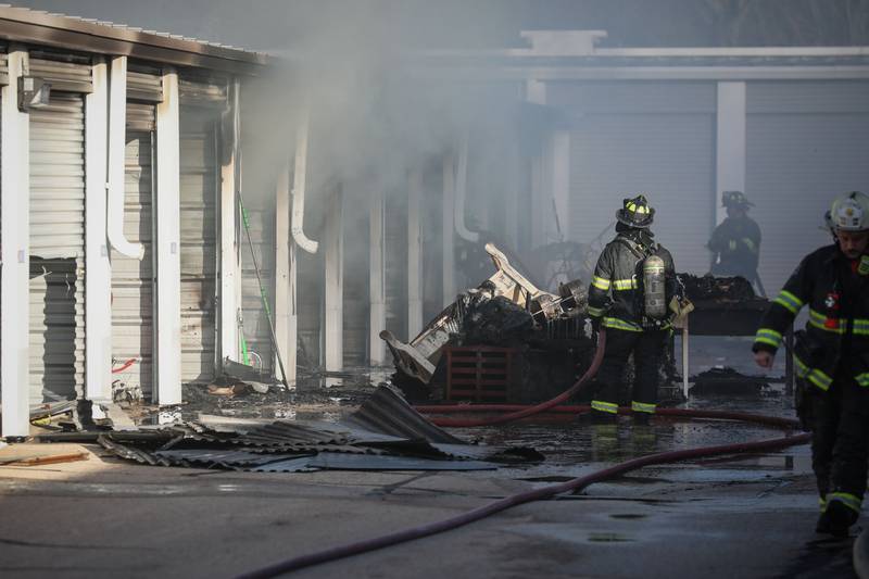 Firefighters at the scene of a fire at at Life Storage, 2301 W. Algonquin Road, Algonquin, on Sunday, Feb. 5, 2024. An estimated 25 to 35 storage units were damaged or destroyed, up from the initial estimate of 20.