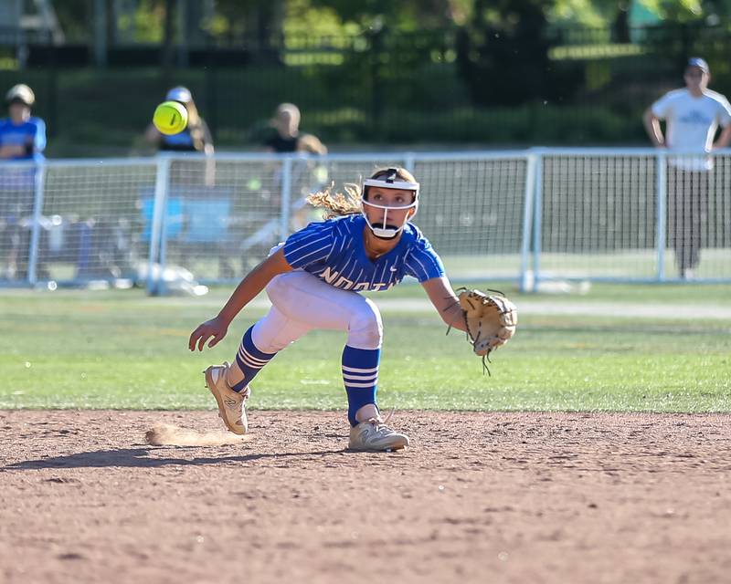 St Charles North's Ginger Ritter (8) fields the last out during the Class 4A Glenbard West Regional Final softball game between Glenbard North at St Charles North.  May 26, 2023.