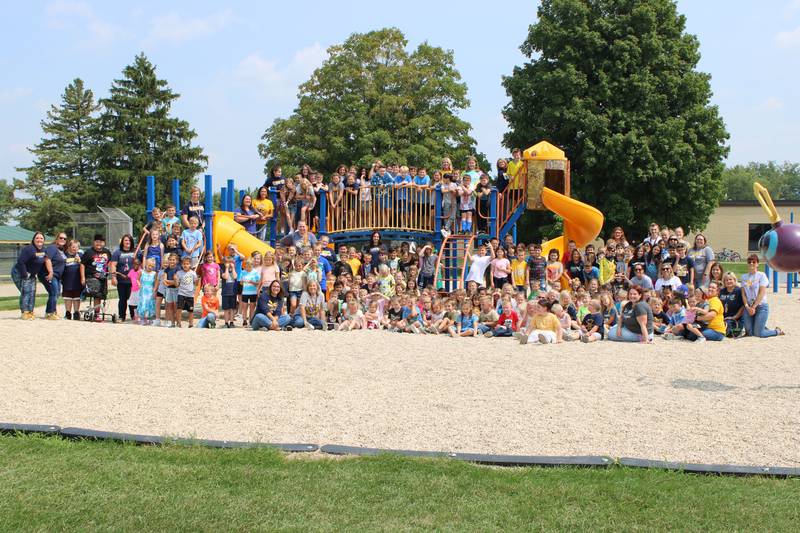 Hiawatha Elementary School students and staff pose for a photo at the school, 401 First St., Kirkland. The school recently received the National Blue Ribbon by the U.S. Department of Education for the school's efforts to close the achievement gap, said Principal Caitlin Benes.