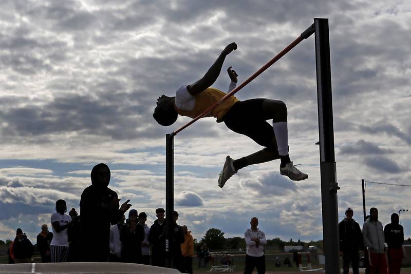 Jacobs’ Khristos Oludimu competes in the high jump during the Huntley IHSA Class 3A Boys Sectional Track and Field Meet on Thursday, May 22, 2025, at Huntley High School.