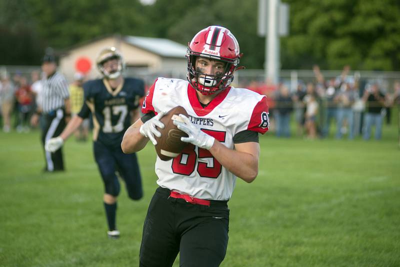 Amboy’s Brennan Blaine crosses the goal line Friday, Aug. 26, 2022 for his second touchdown of the game against Polo.