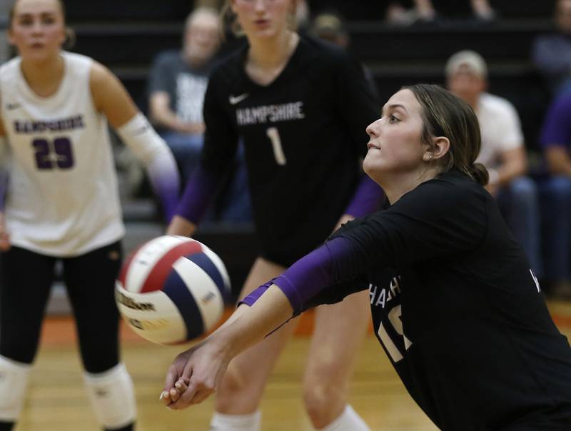 Hampshire's Katelyn Petterson bumps the ball forward during an IHSA Class 4A McHenry Sectional volleyball match against Libertyville on Tuesday, Nov. 5, 2024, at McHenry High School Freshman Campus.
