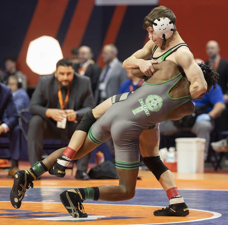 Grays Lake Central’s Vince DeMarco (top) is controlled by Ray Long of Niles Notre Dame in the 106 pound weight class of the 2A state individual wrestling finals Saturday, Feb. 22, 2025, at State Farm Center in Champaign.