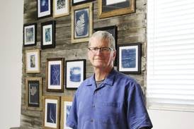 Erie photographer shines a light on business