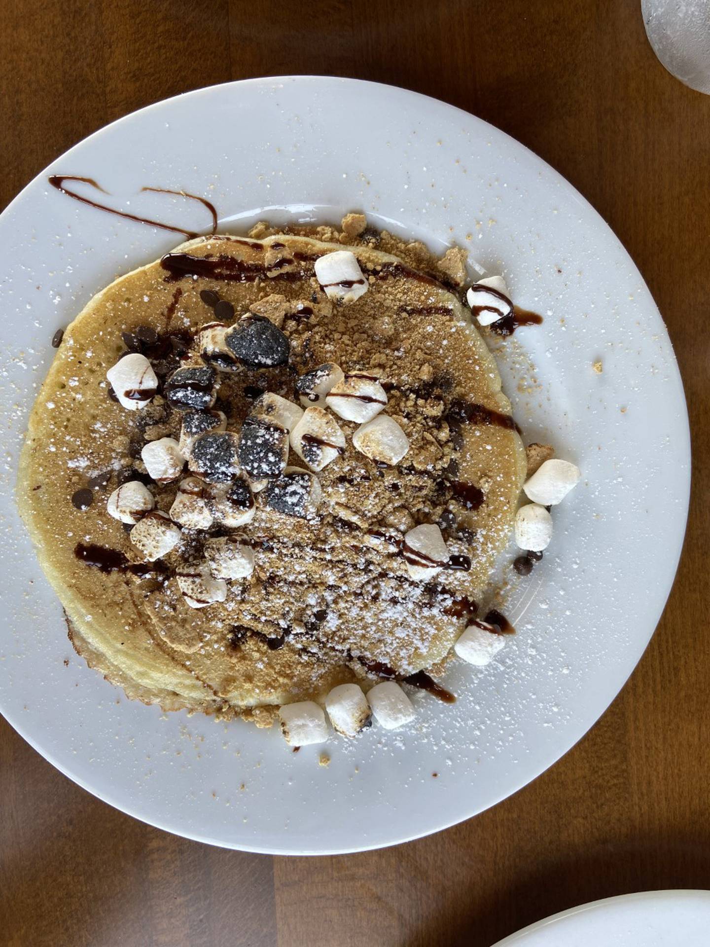 S'mores pancakes, $13, at Maple & Hash in Pingree Grove with chocolate chips, toasted marshmallows, graham cracker cookies, drizzled with chocolate sauce.