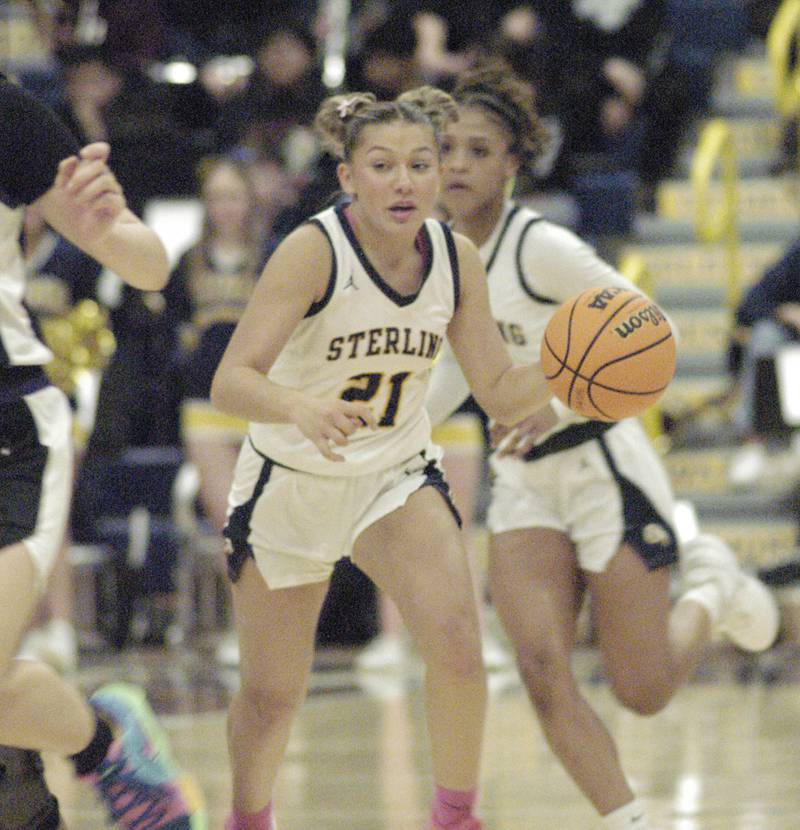 Warrior Jae James brings the ball upcourt. The Sterling Golden Warriors faced off against Plano Lady Reapers in an IHSA 3A Regional girls final at Musgrove Fieldhouse in Sterling on February 20, 2025. Sterling won the game 70-38.