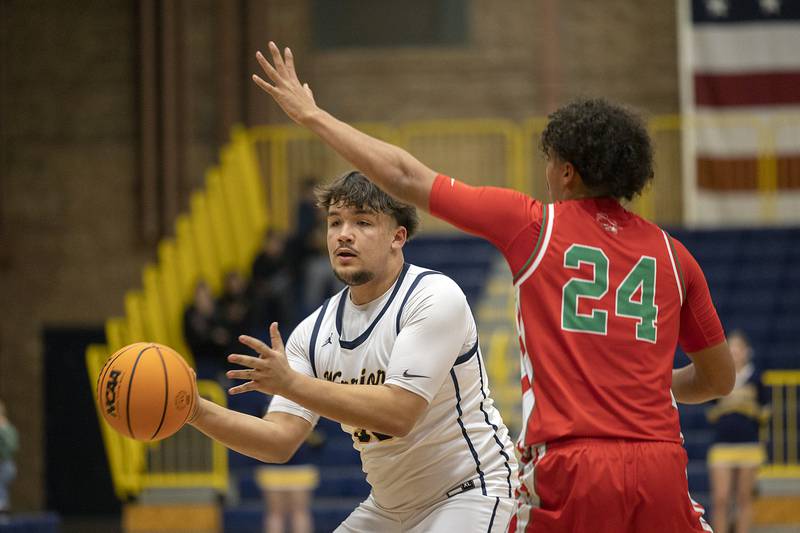 Sterling’s Maddux Osborn makes a pass against Lasalle-Peru’s Marion Persich Tuesday, Jan. 7, 2025, at Sterling High School.
