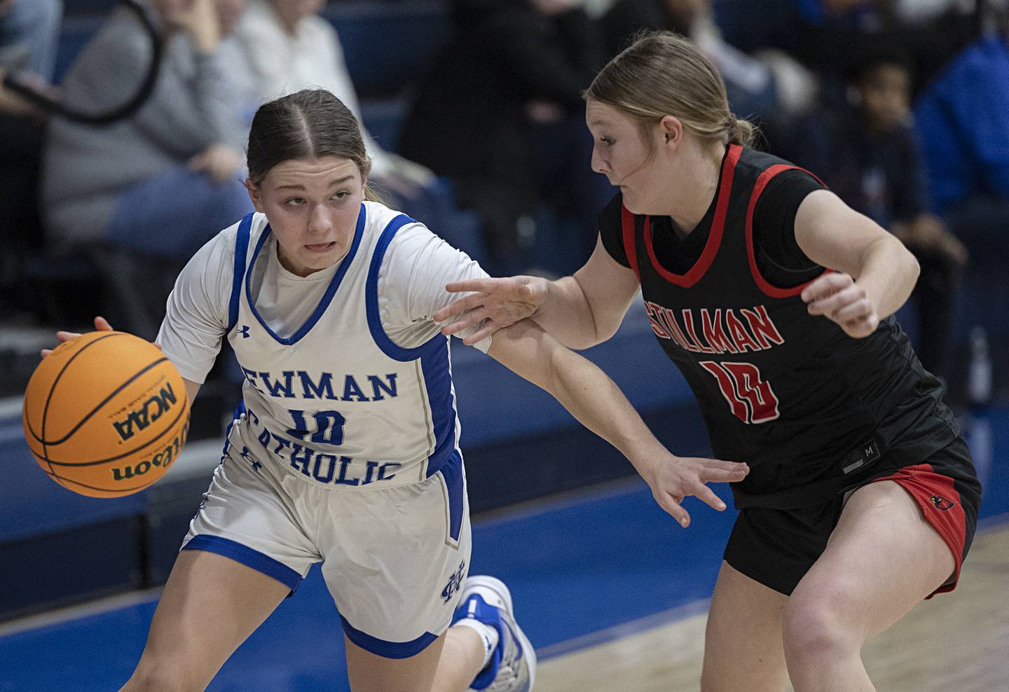 Newman’s Elaina Allen handles the ball against Stillman Valley’s Sydney Musial Monday, Feb. 2, 2026.