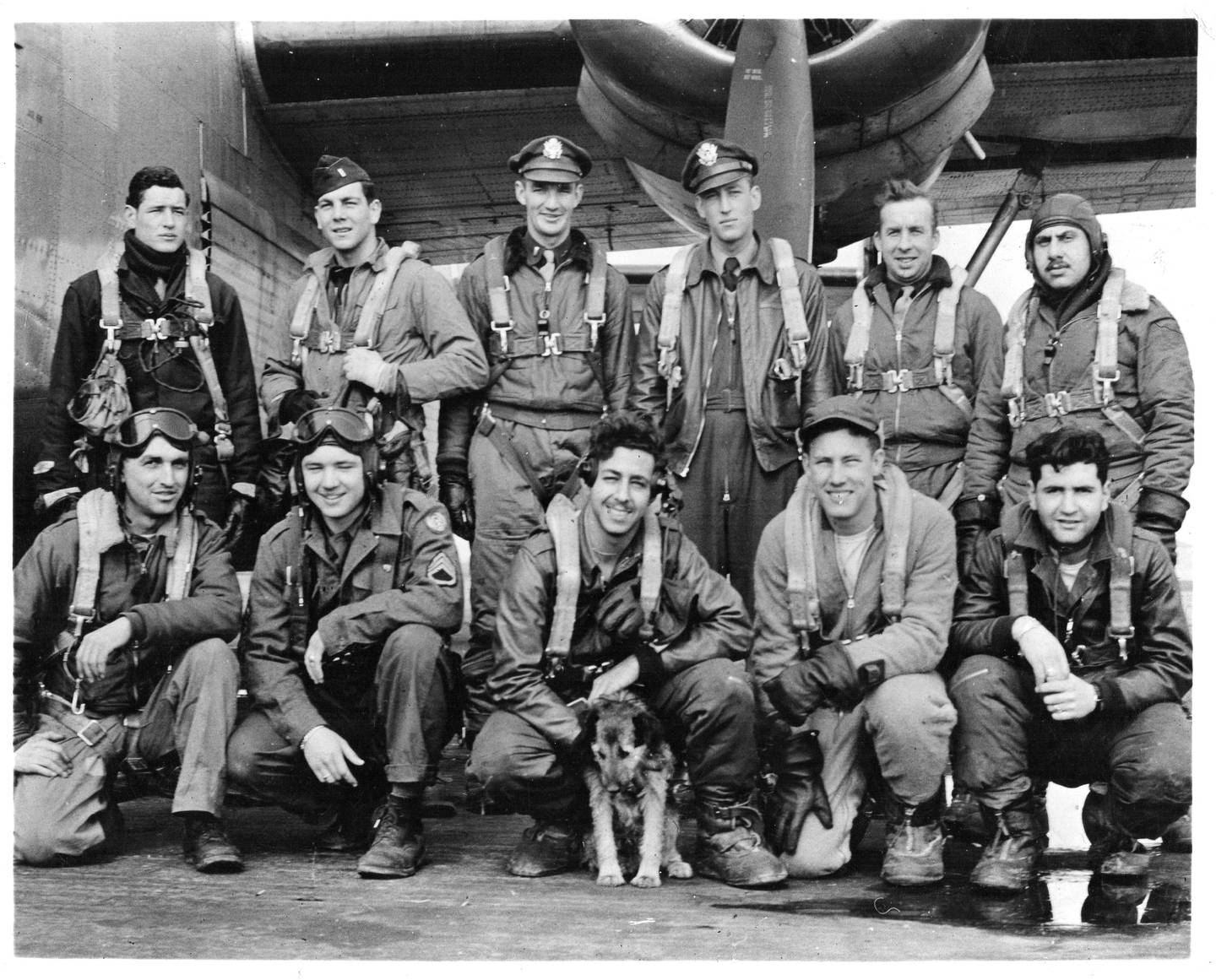 The Farrington crew served during World War II in the Second Air Division 466th Bomb Group at the Attlebridge Army Airforce base. Photo taken March 26, 1945. Nine members of 11 of this crew, including waist gunner Robert E. Peterson Sr. (front row, first person), died April 21, 1945 after being shot down by enemy fire flying near Regensburg, Germany.