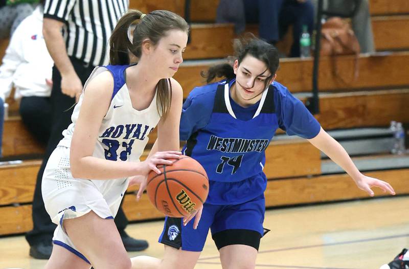 Hinckley-Big Rock's Alyssa Swanson is guarded by Westminster Christian's Sarah DiNapolli during their regional semifinal game Monday, Feb. 13, 2023, at Hinckley-Big Rock High School.