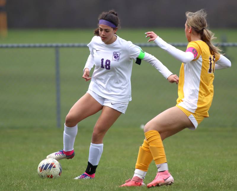 Hampshire’s Ariana Salgado movs the ball in varsity girls soccer on Thursday, April 17, 2025, at Jacobs High School in Algonquin.