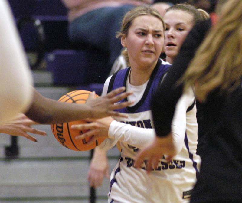 Dixon's Reese Dambman moves the ball through traffic.. The Dixon Duchesses played  the Stillman Valley Cardinals in the third place game of the Dixon Holiday Tournament at Dixon High School on Monday, December 29th, 2025.